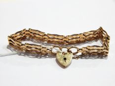 9ct gold three-bar gate bracelet, 12.9g approx.