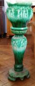 Edwardian green glazed pottery jardiniere and stand, foliate design,