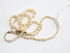 String of graduated cultured pearls on 9ct white gold pierced clasp