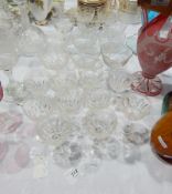 Etched champagne glasses with floral decoration and other wines