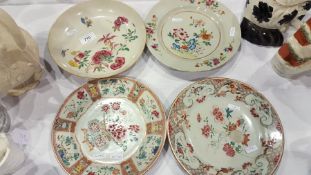 Oriental famille rose plate, the centre painted with vase of flowers,