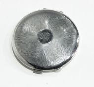 George VI lady's silver compact of circular form with engine-turned engraving,