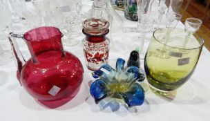 Cranberry water jug, red overlay jar with vine and floral decoration, 20th century flowerhead bowl,