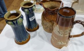 Pair Doulton stoneware Art Nouveau vases each shouldered with everted rim, flared body,