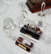 Two modern glass ships in bottles,