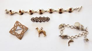 Gold-coloured metal and seedpearl brooch, gold dog charm,