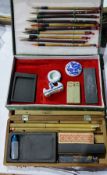 Two boxes of Chinese writing/painting sets