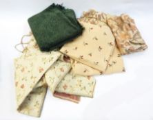 Two pairs of jacquard style curtains in cream and gold, a length of machine embroidered material