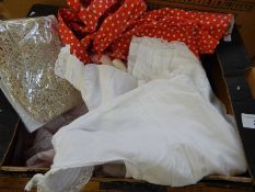 A selection of doilies, lace baby gowns, stockings, etc.