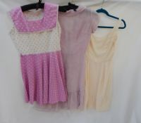 A 1960's cotton sun dress in white and purple with a sailor style collar,