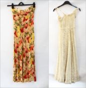 A 1930's satin full-length evening gown, floral pattern, spaghetti straps, faux-buttons to the back,