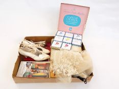 A faux-flower wedding headdress circa 1920's, a pair of kid cream 1920's shoes, boxed handkerchiefs,