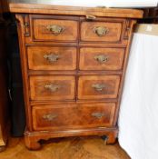 A Georgian style walnut television cabinet with six short dummy drawers,