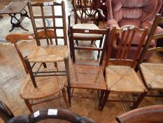 A stained beech child's chair with rush seat,