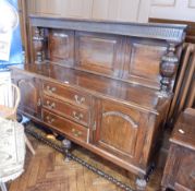A Jacobean style oak sideboard,