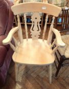 A modern smoker's bow chair with turned and bobbin open splats on tapering supports