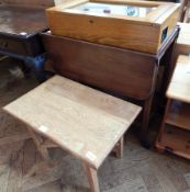 An oak mirror door trinket cabinet with interior fittings,
