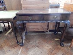 A Chippendale style mahogany veneer side table with rectangular top and moulded edge,