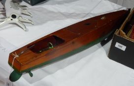 Early 20th century painted mahogany clockwork model speedboat, maker's mark 
