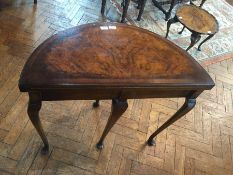 Georgian style walnut demi-lune foldover top card table with baize lined interior on shell carved