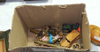 A small quantity of cars, flashlight, a brass ale barrel pump,