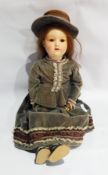 German sprayed bisque headed doll marked 