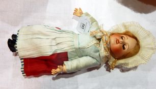 Bisque headed doll marked 