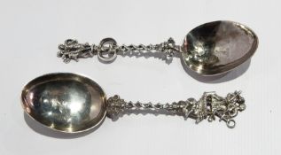 Two continental silver spoons with spiral handles and figure finials,