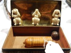 Three ivory monkeys, a sewing pin holder,