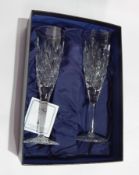 A boxed pair of Waterford Crystal flared rim wine glasses from the Millennium Collection,