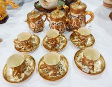 Japanese Satsuma pottery coffee pot with dragon spout, covered sugar basin and covered milk jug,