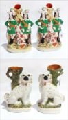 Two Staffordshire spaniel flatback spill vases,