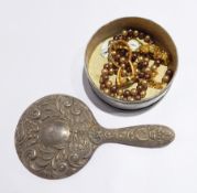 A silver backed hand mirror with bevel plate together,