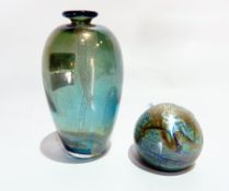 An iridescent glass vase, ovoid bottle form, blue ground with green/gold mottled effect,
