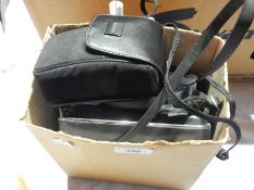 A pair of Vanguard modern binoculars,