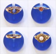 18ct gold wedding band and three other dress rings