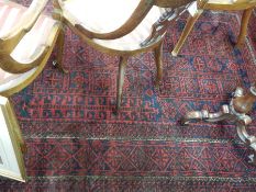 Caucasian style rug with blue field and harshang decoration borders,