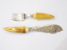 Pair of horn-handled fish servers with floral and scroll engraving on each