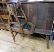 19th century carved oak carding machine,