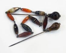 Victorian Scottish hardstone hatpin/chignon hair ornament in the form of eleven variously shaped