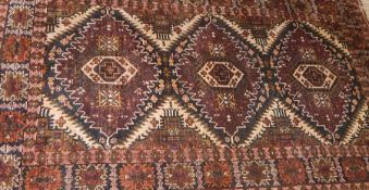 Caucasian style wool rug with triple lozenge totem, harshang borders,