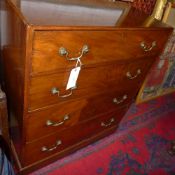 A C19th figured mahogany  chest of four graduated drawers with brass drop handles raised on a plinth
