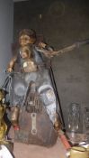 A mixed component sculpture by Gerard Quenum, baby head engine parts