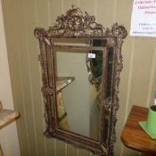 A gesso style mirror in the Rococo style