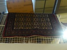 A fine north west Persian Senneh rug 185 x 130 cm, repeating herate motifs on an ivory filed