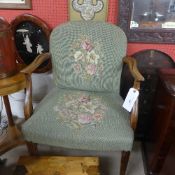 A Hepplewhite design walnut open armchairs the oval pad back above stuffover seat upholstered in
