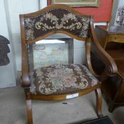 A Victorian walnut metamorphic hinged swing back above pad seat on scroll supports
