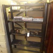 An ebonised three tiered bamboo bookcase with open shelves
