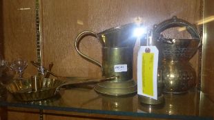 A collection of brassware including miners lamp, chamber stick and a Persian brass basket