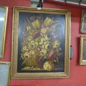 An oil on canvas Dutch style still life flower arrangements